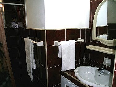 Ba&ntilde;o de una habitacion