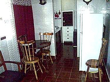 Salita, con la cocina al fondo
